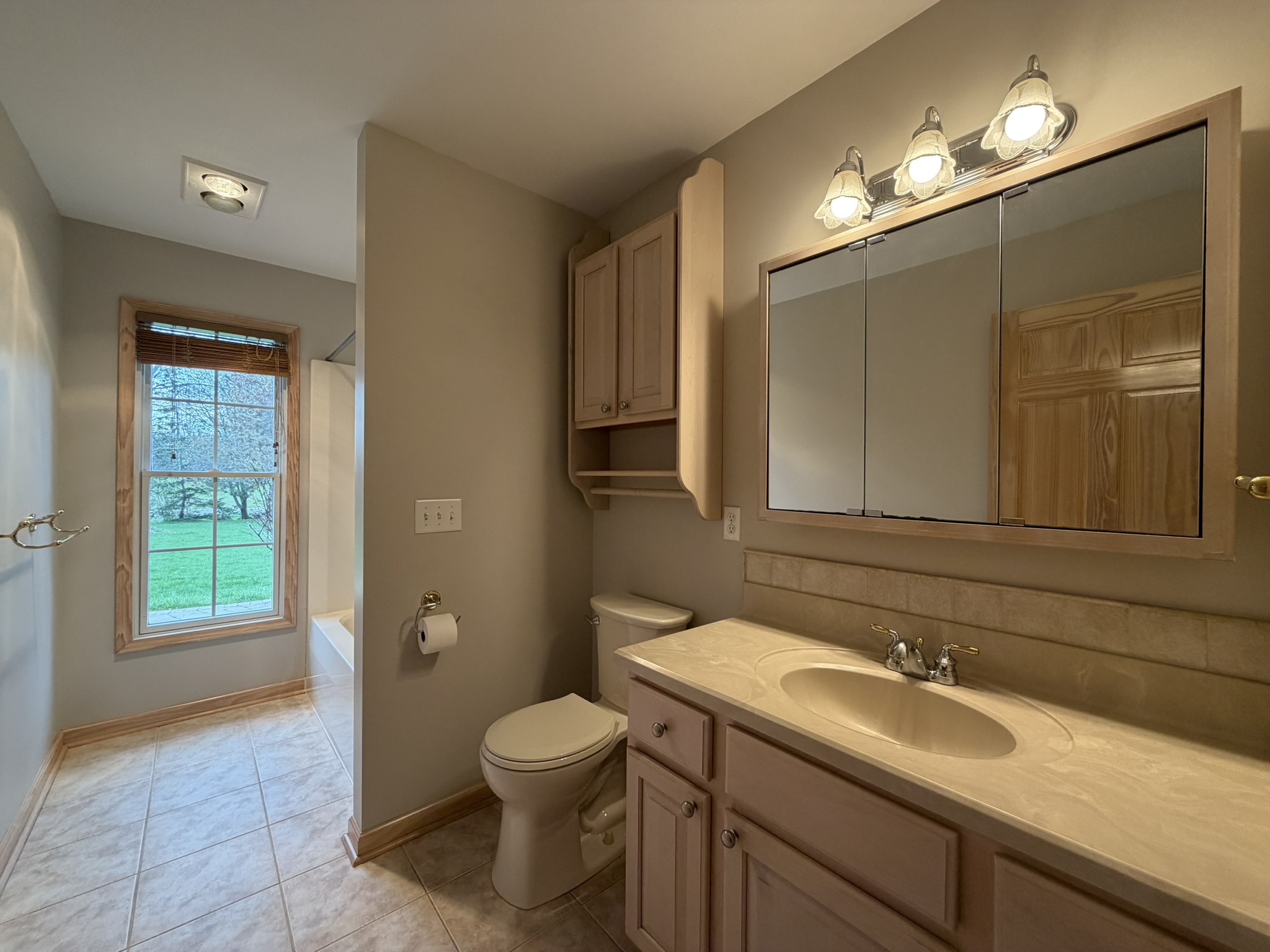 Bathroom 2 — vanity with garden window