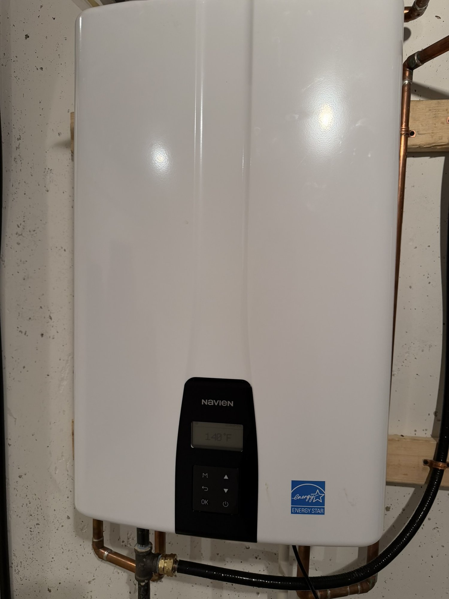 Navien tankless water heater — Energy Star, set to 140°F with recirculation
